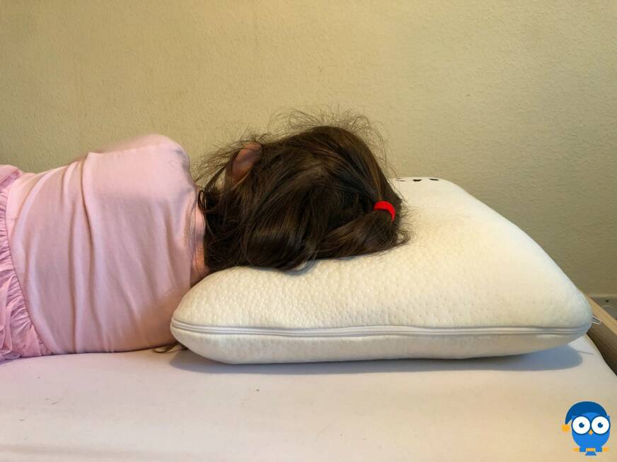 Child laying on side on Panda Kids pillow
